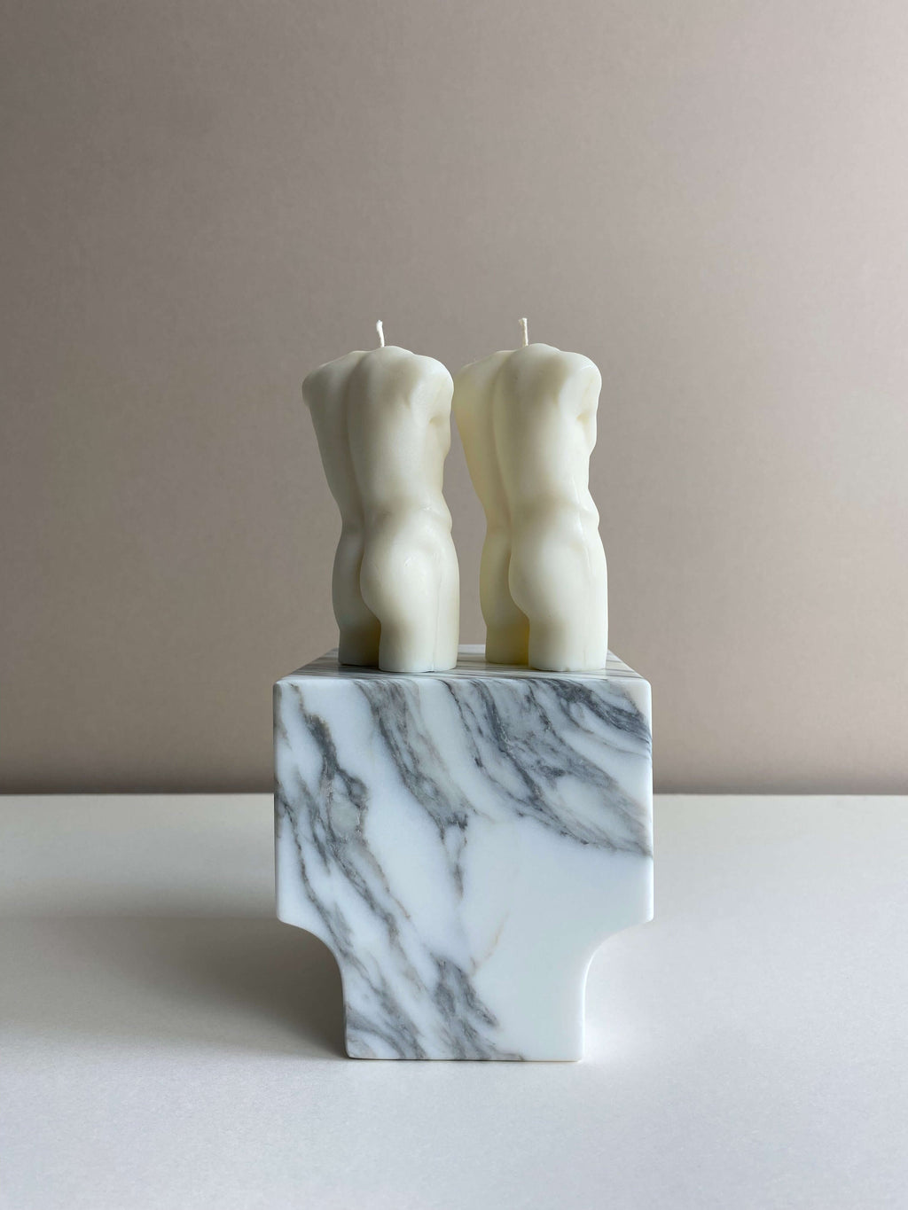 Atelier Ethos Pair Of Male Torso Candles A candle duo in natural soy wax showcasing sculptural elegance and refined craftsmanship. Perfect for weddings or engagement gifts. Sustainable, luxurious, with 10% of profits donated to charity. £18.00