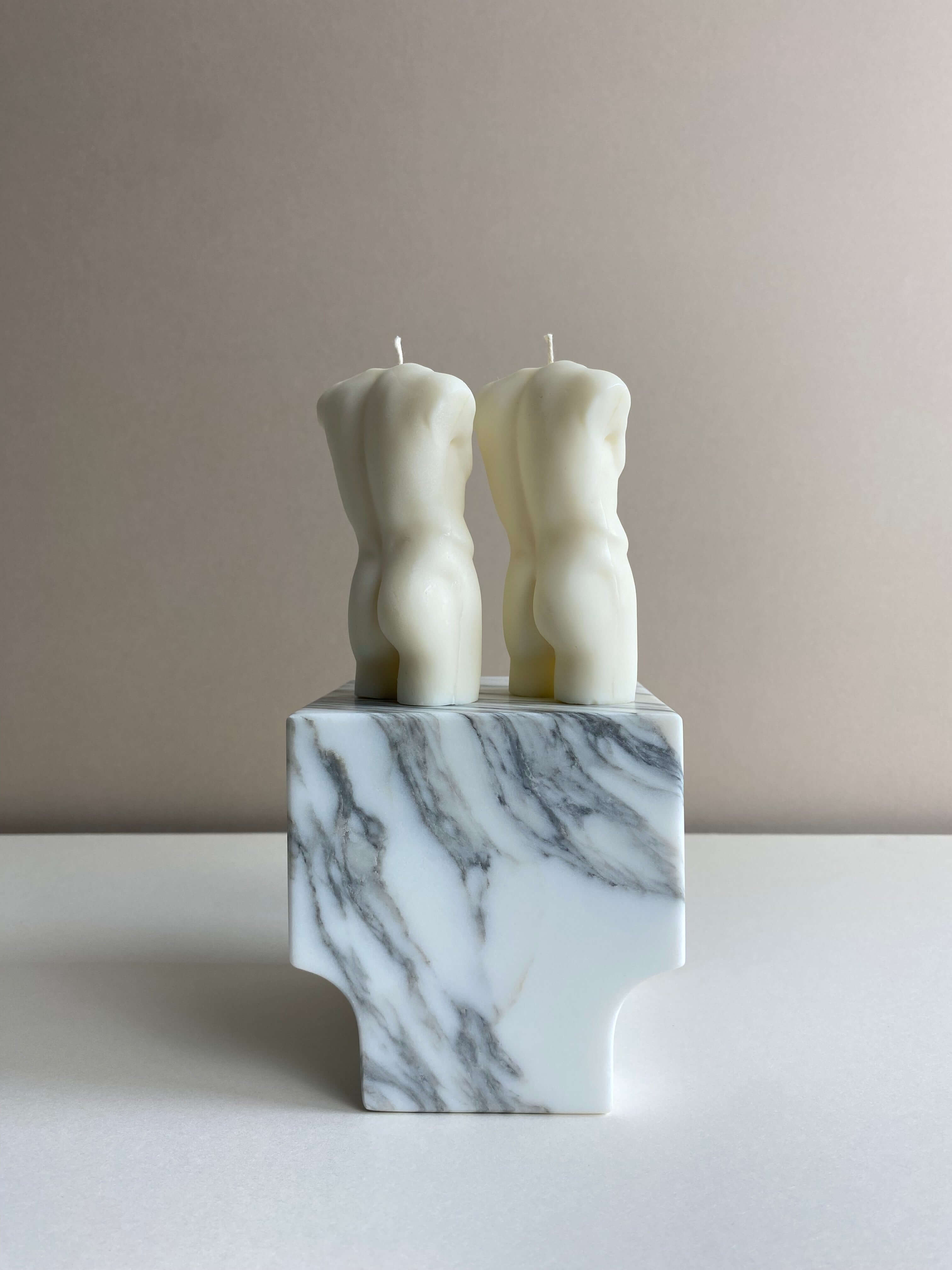 Atelier Ethos Pair Of Male Torso Candles A candle duo in natural soy wax showcasing sculptural elegance and refined craftsmanship. Perfect for weddings or engagement gifts. Sustainable, luxurious, with 10% of profits donated to charity. £18.00