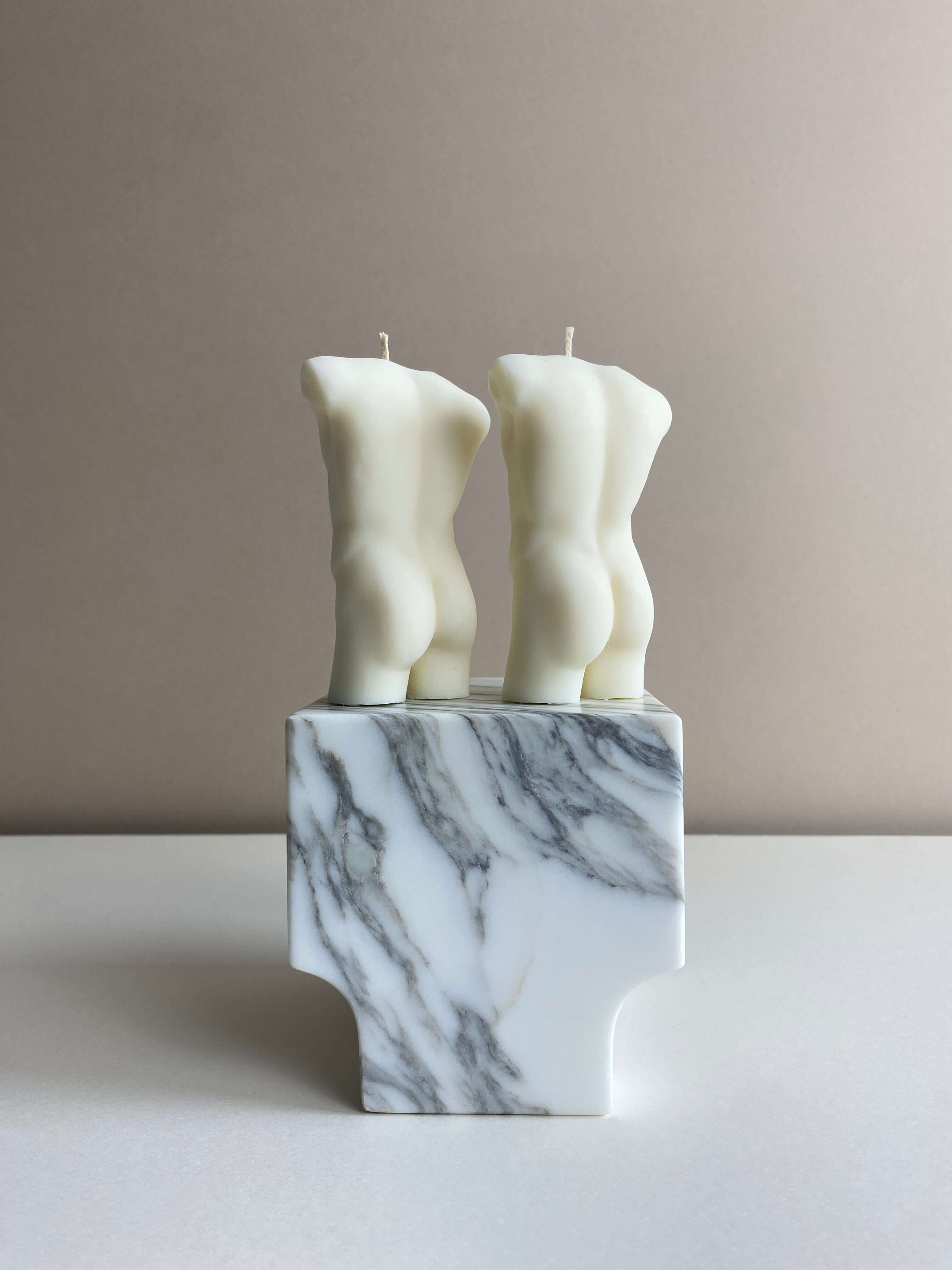 Atelier Ethos Pair Of Male Torso Candles A candle duo in natural soy wax showcasing sculptural elegance and refined craftsmanship. Perfect for weddings or engagement gifts. Sustainable, luxurious, with 10% of profits donated to charity. £18.00