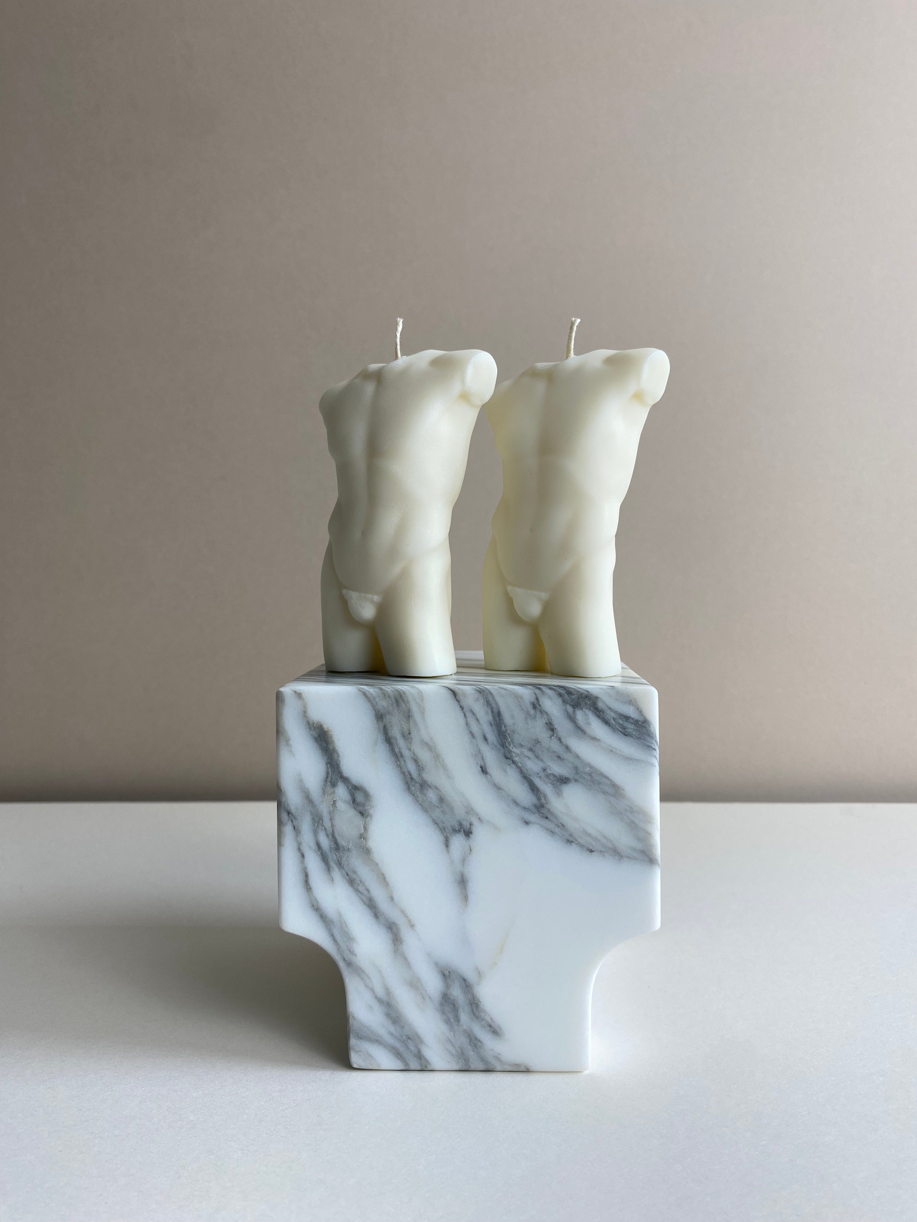 Atelier Ethos Pair Of Male Torso Candles A candle duo in natural soy wax showcasing sculptural elegance and refined craftsmanship. Perfect for weddings or engagement gifts. Sustainable, luxurious, with 10% of profits donated to charity. £18.00
