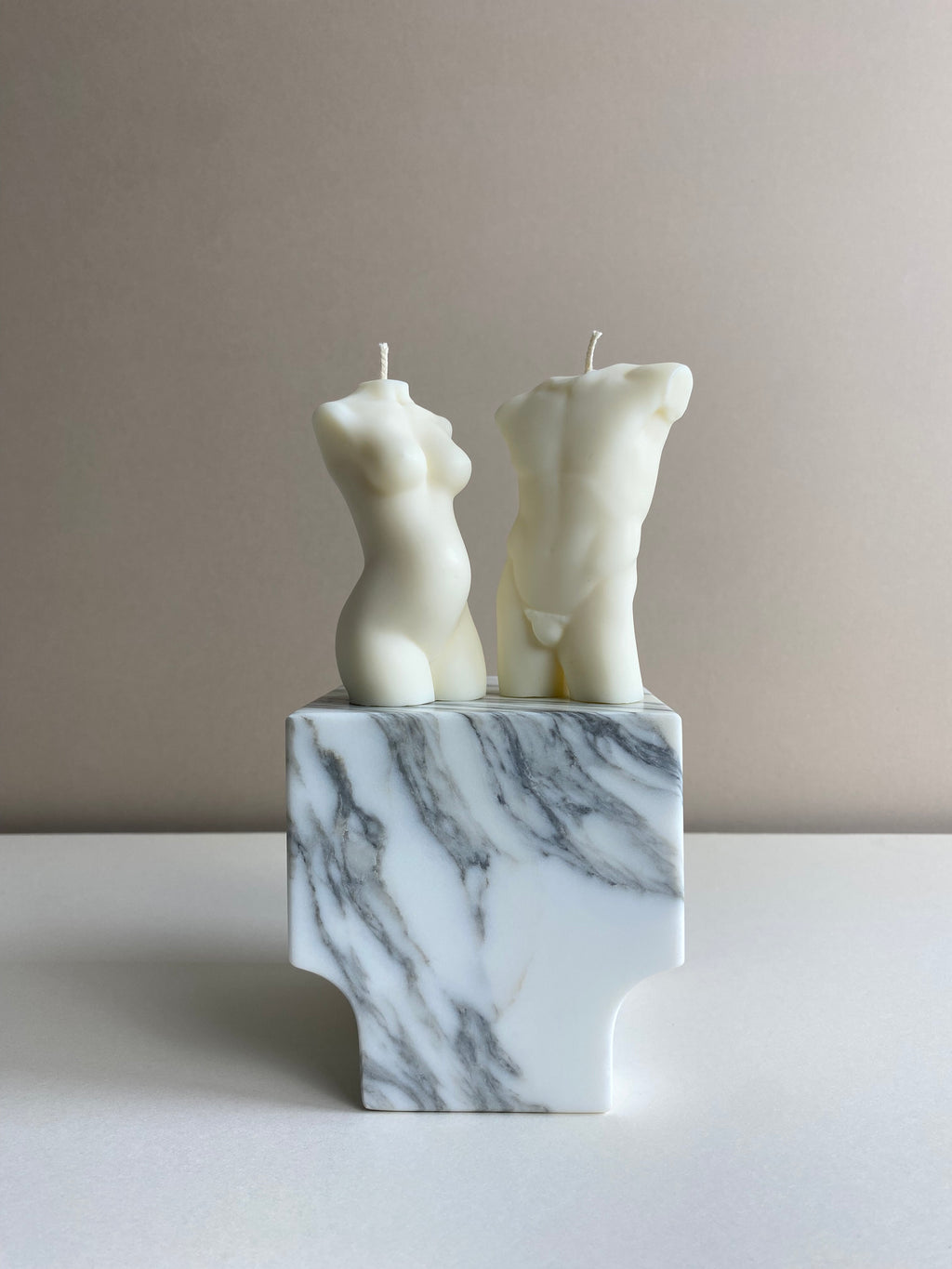 Atelier Ethos Pair Of Male And Pregnant Lady Candles A candle duo in natural soy wax honouring parenthood and sculptural artistry. Perfect as a baby shower or gift for expecting couples. Sustainable, luxurious, 10% of profits donated to charity. £18.00