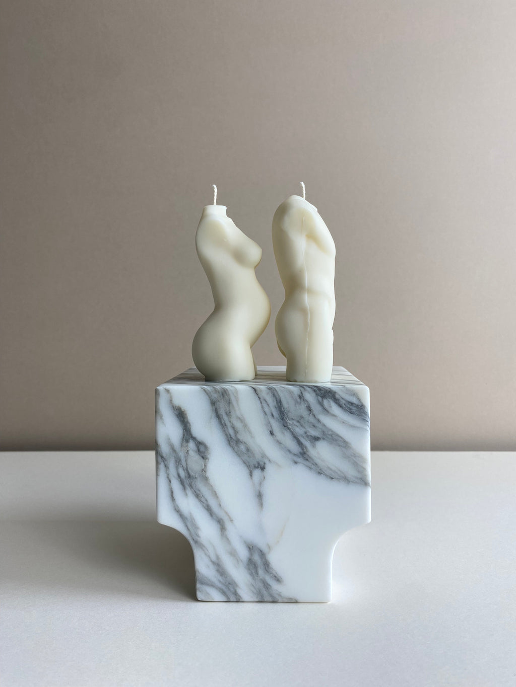 Atelier Ethos Pair Of Male And Pregnant Lady Candles A candle duo in natural soy wax honouring parenthood and sculptural artistry. Perfect as a baby shower or gift for expecting couples. Sustainable, luxurious, 10% of profits donated to charity. £18.00