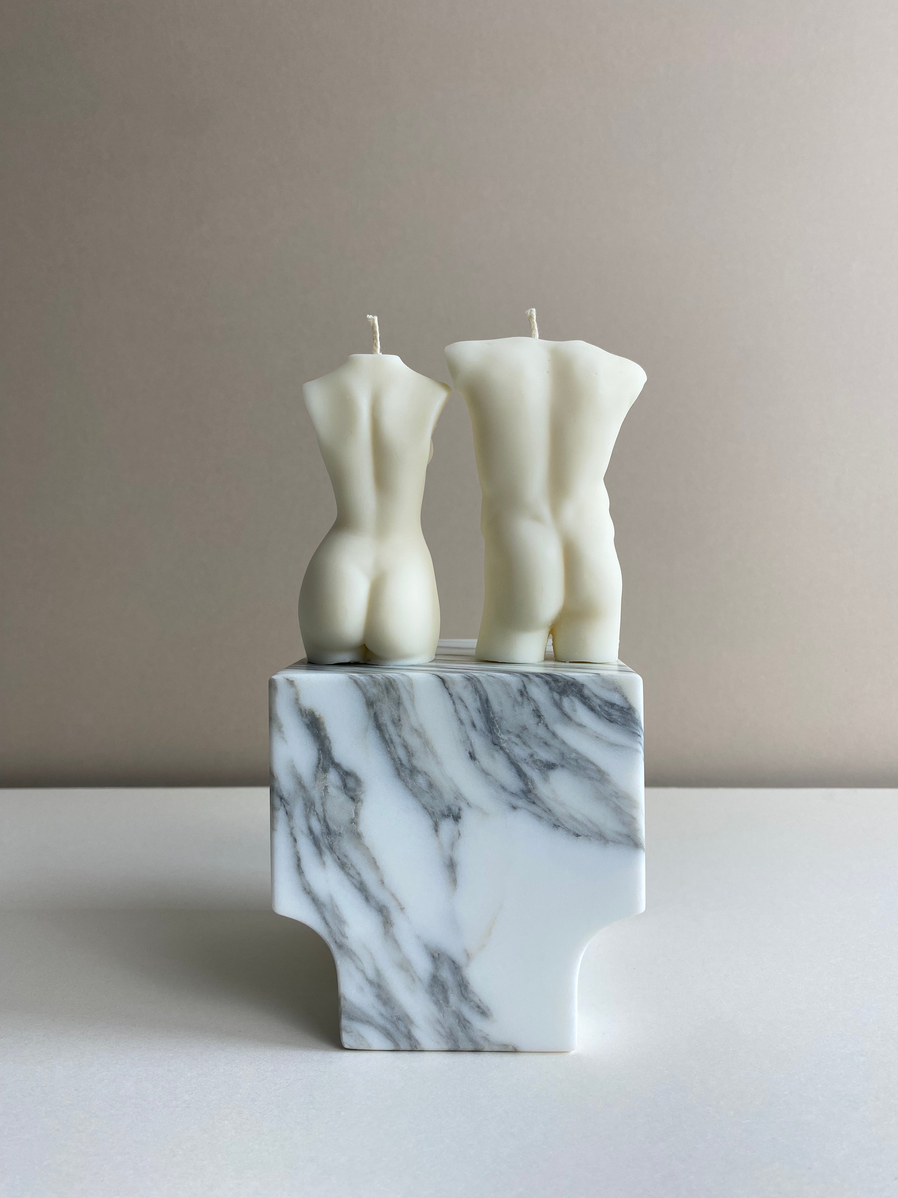 Atelier Ethos Pair Of Male And Pregnant Lady Candles A candle duo in natural soy wax honouring parenthood and sculptural artistry. Perfect as a baby shower or gift for expecting couples. Sustainable, luxurious, 10% of profits donated to charity. £18.00