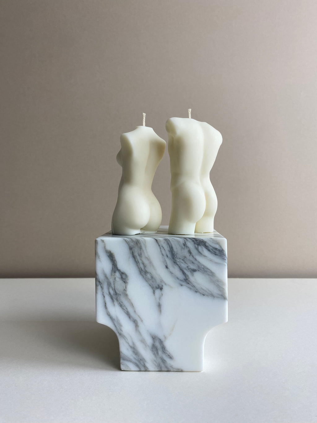 Atelier Ethos Pair Of Male And Pregnant Lady Candles A candle duo in natural soy wax honouring parenthood and sculptural artistry. Perfect as a baby shower or gift for expecting couples. Sustainable, luxurious, 10% of profits donated to charity. £18.00