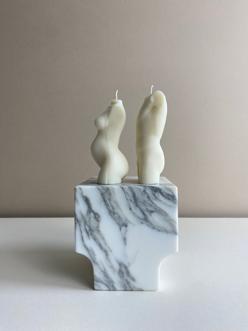 Atelier Ethos Pair Of Male And Pregnant Lady Candles A candle duo in natural soy wax honouring parenthood and sculptural artistry. Perfect as a baby shower or gift for expecting couples. Sustainable, luxurious, 10% of profits donated to charity. £18.00