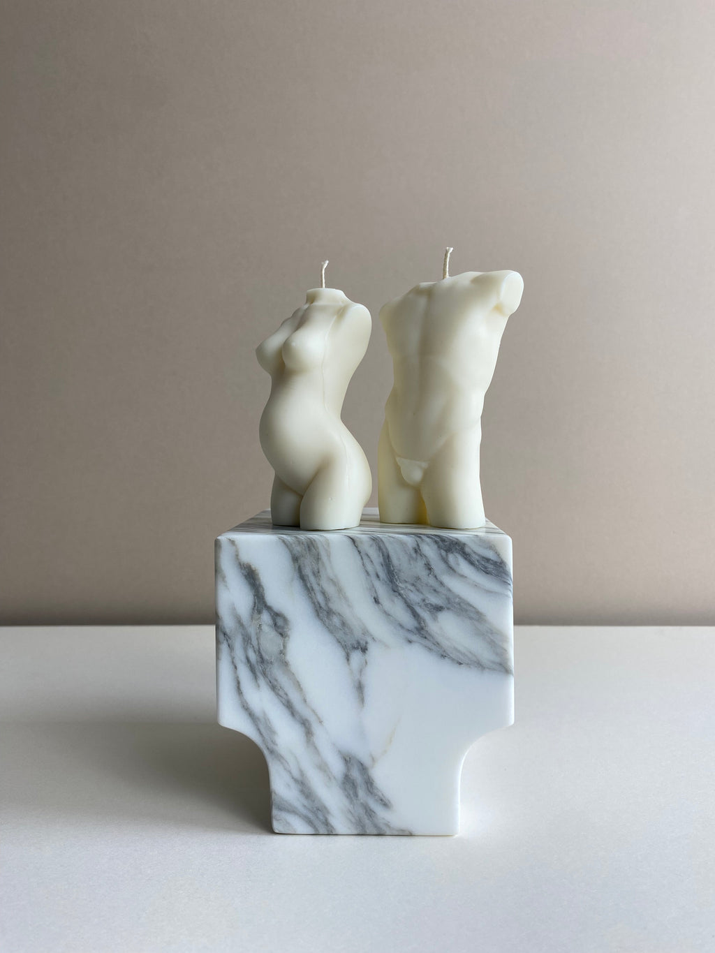 Atelier Ethos Pair Of Male And Pregnant Lady Candles A candle duo in natural soy wax honouring parenthood and sculptural artistry. Perfect as a baby shower or gift for expecting couples. Sustainable, luxurious, 10% of profits donated to charity. £18.00