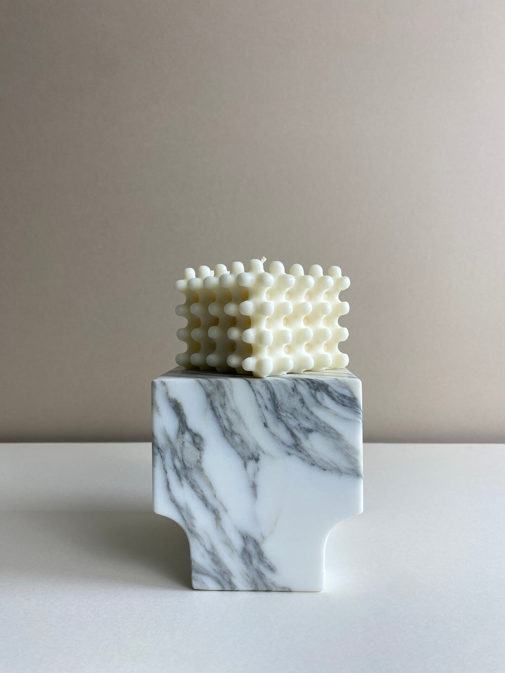 Atelier Ethos Large Nubbed Cube Candle Sculptural and bold, a candle hand-poured in natural soy wax with distinctive rounded nubs. Sustainable, luxurious, and 10% of profits go to charity. £20.00