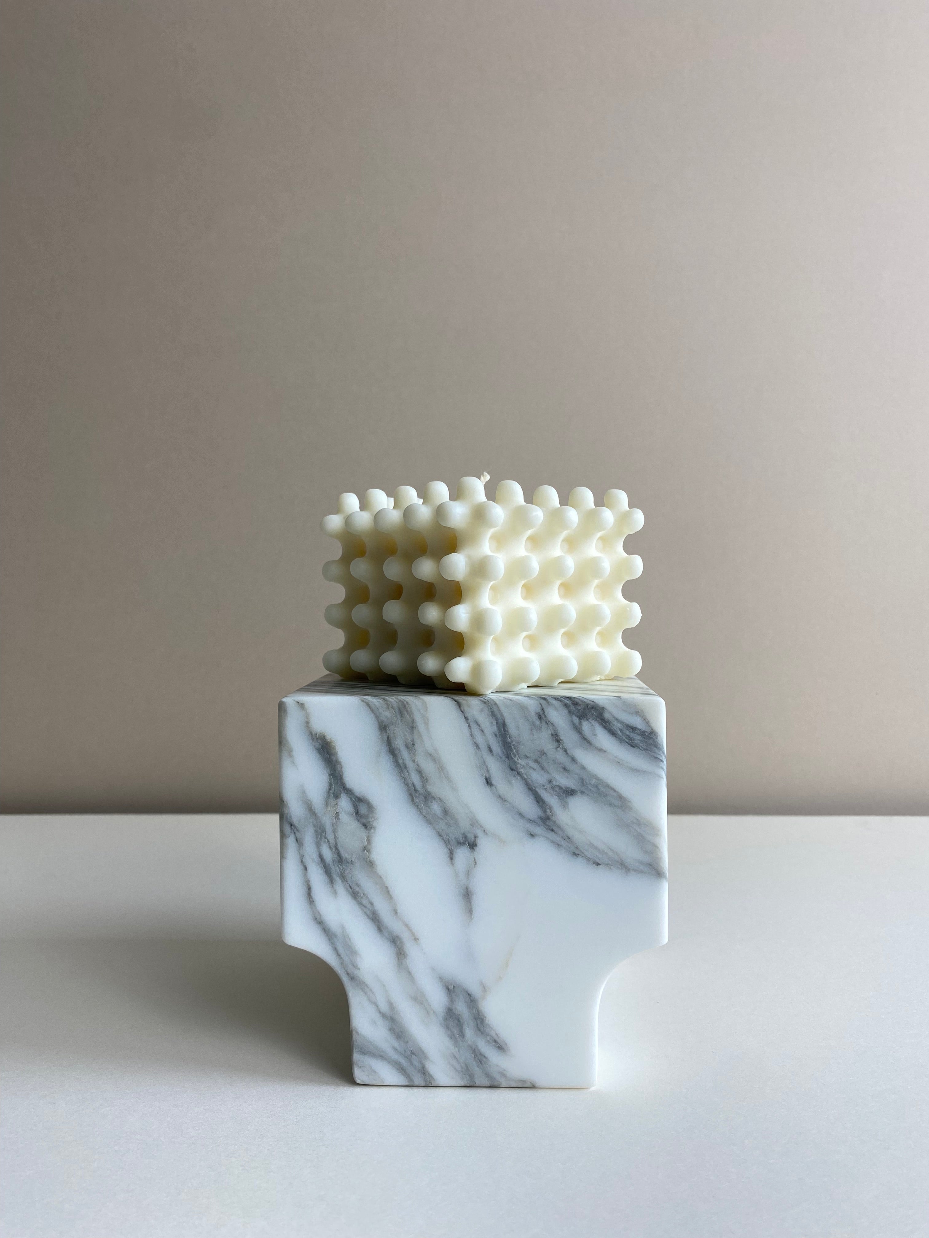 Atelier Ethos Large Nubbed Cube Candle Sculptural and bold, a candle hand-poured in natural soy wax with distinctive rounded nubs. Sustainable, luxurious, and 10% of profits go to charity. £20.00