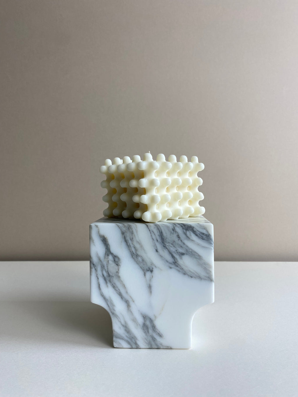Atelier Ethos Large Nubbed Cube Candle Sculptural and bold, a candle hand-poured in natural soy wax with distinctive rounded nubs. Sustainable, luxurious, and 10% of profits go to charity. £20.00