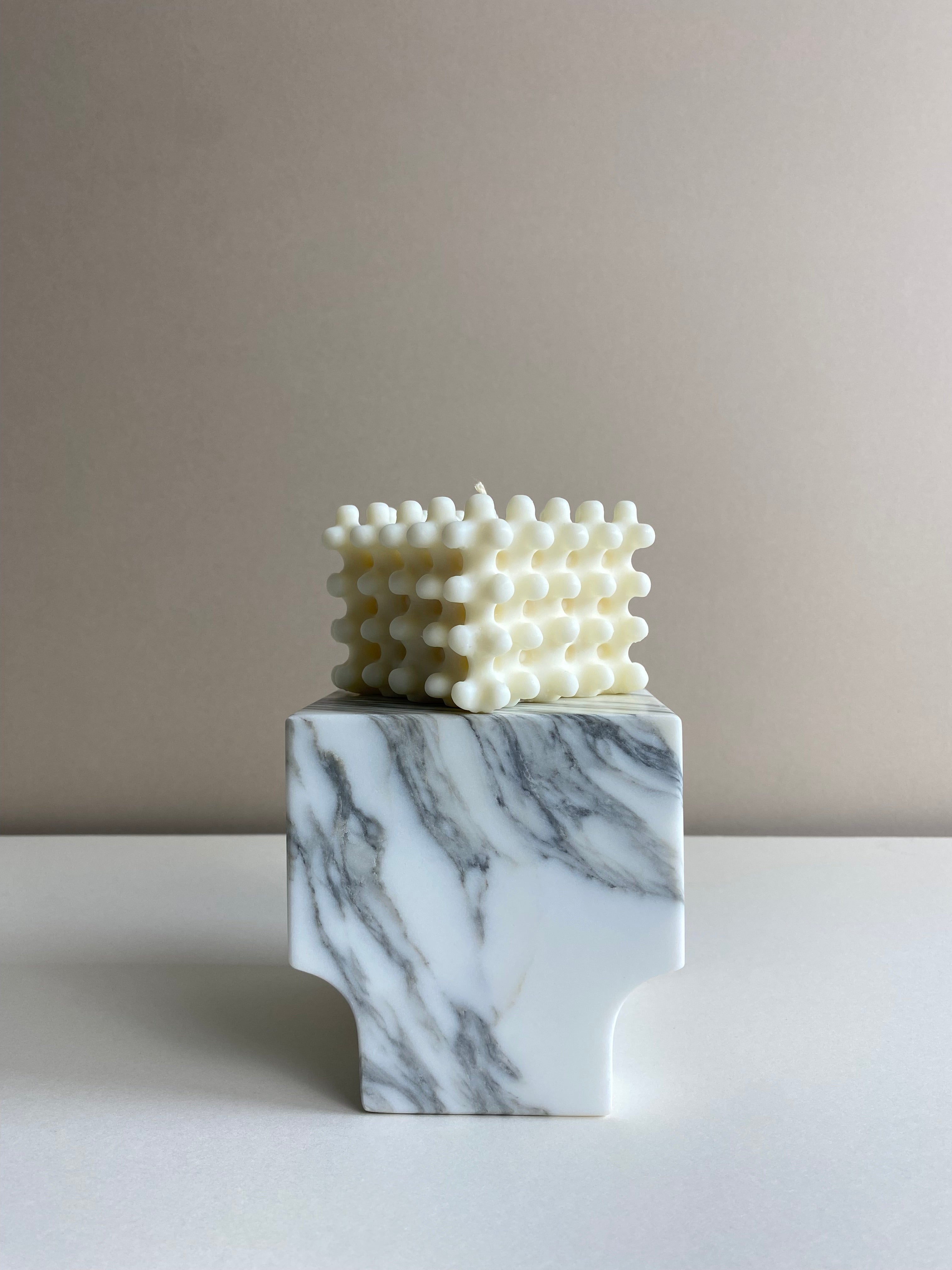 Atelier Ethos Large Nubbed Cube Candle Sculptural and bold, a candle hand-poured in natural soy wax with distinctive rounded nubs. Sustainable, luxurious, and 10% of profits go to charity. £20.00