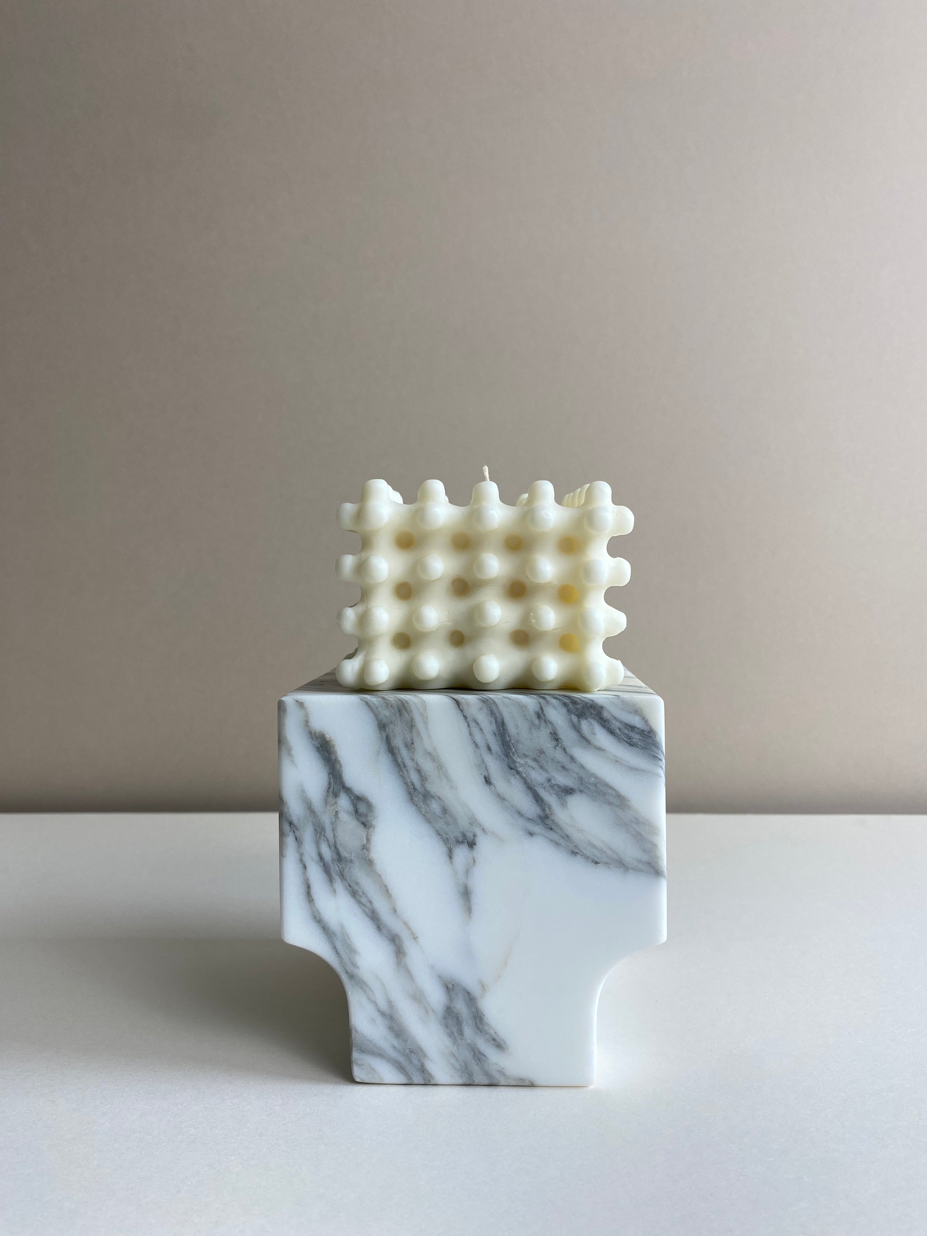Atelier Ethos Large Nubbed Cube Candle Sculptural and bold, a candle hand-poured in natural soy wax with distinctive rounded nubs. Sustainable, luxurious, and 10% of profits go to charity. £20.00