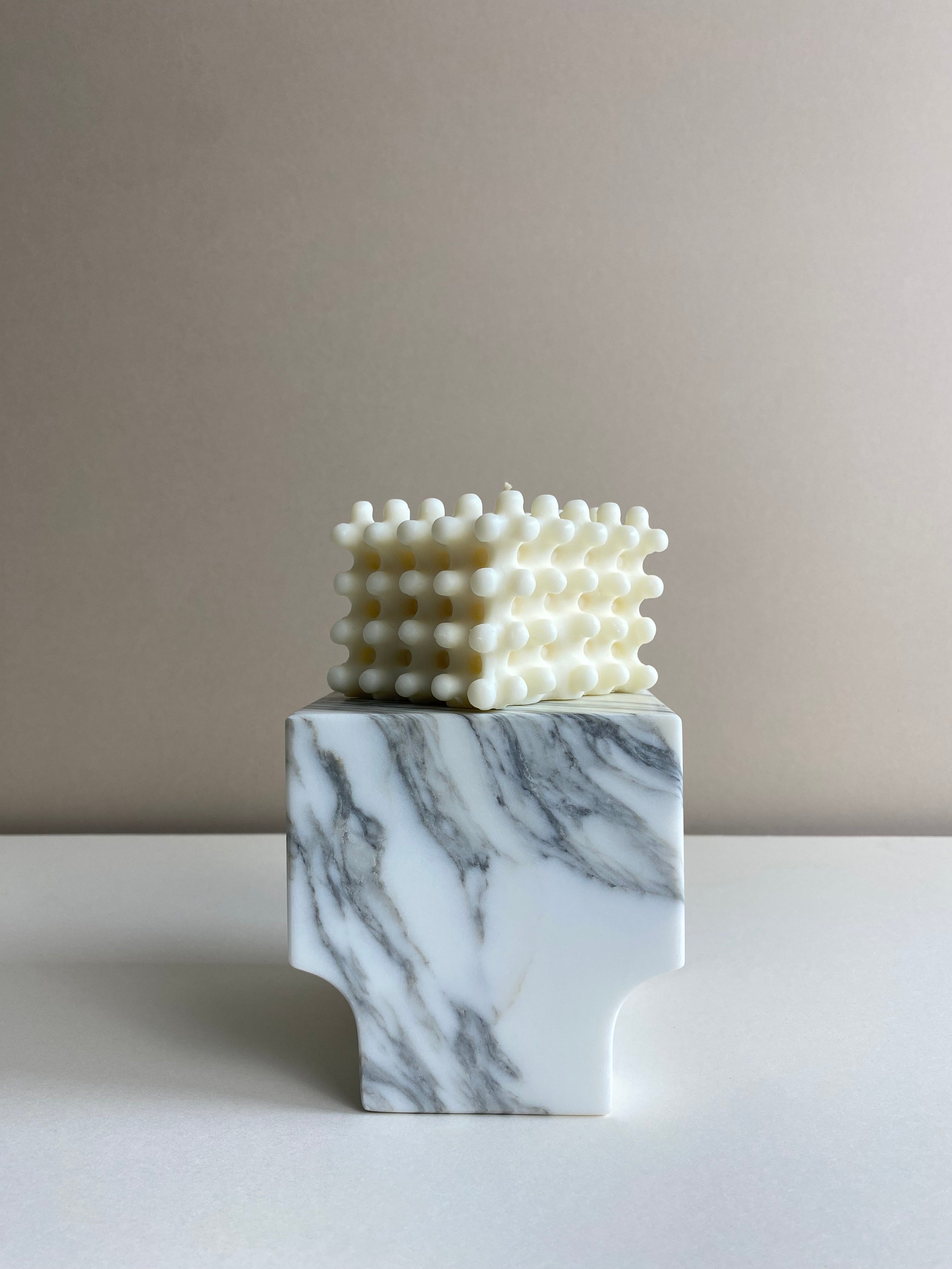 Atelier Ethos Large Nubbed Cube Candle Sculptural and bold, a candle hand-poured in natural soy wax with distinctive rounded nubs. Sustainable, luxurious, and 10% of profits go to charity. £20.00