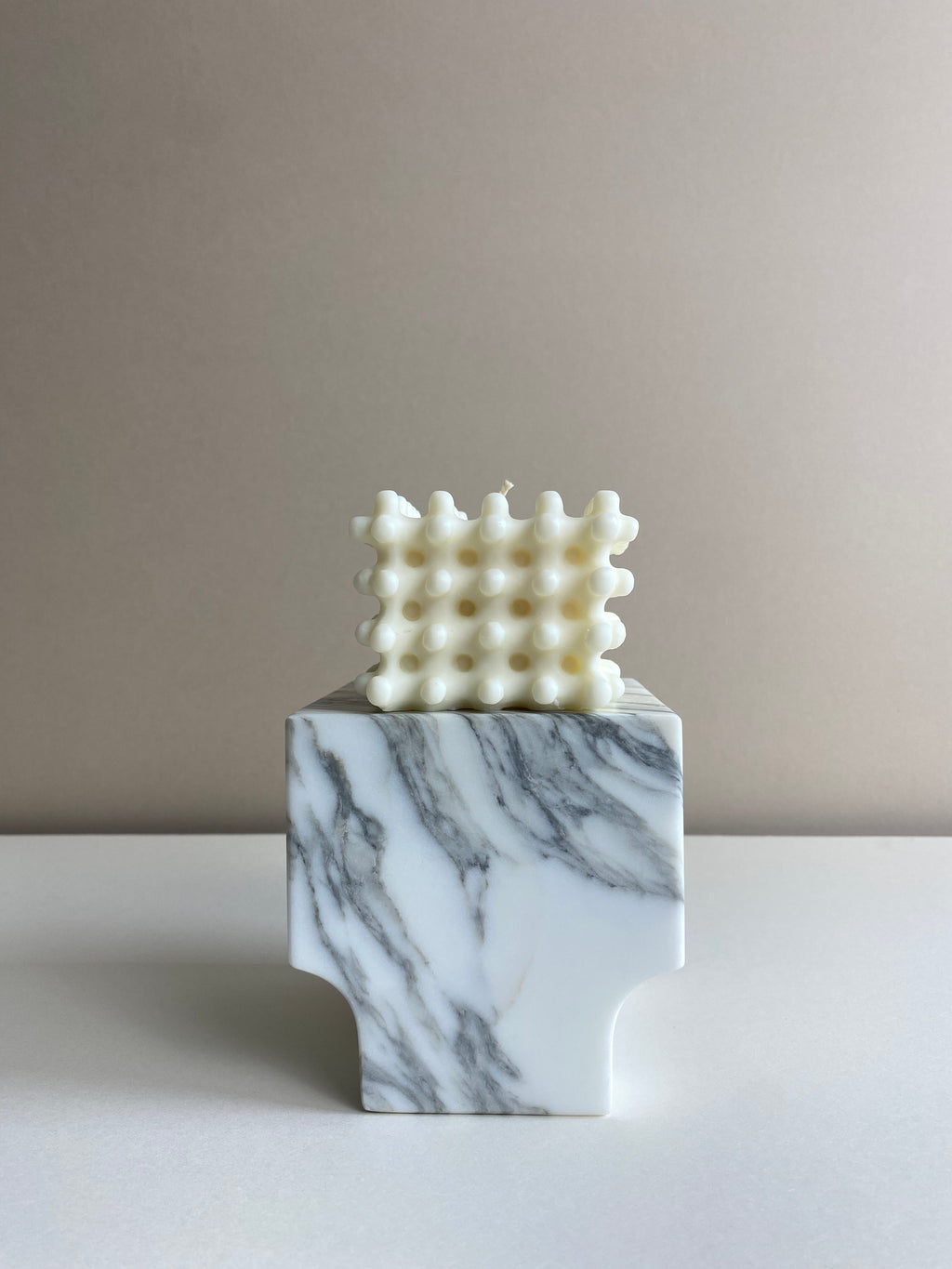 Atelier Ethos Large Nubbed Cube Candle Sculptural and bold, a candle hand-poured in natural soy wax with distinctive rounded nubs. Sustainable, luxurious, and 10% of profits go to charity. £20.00