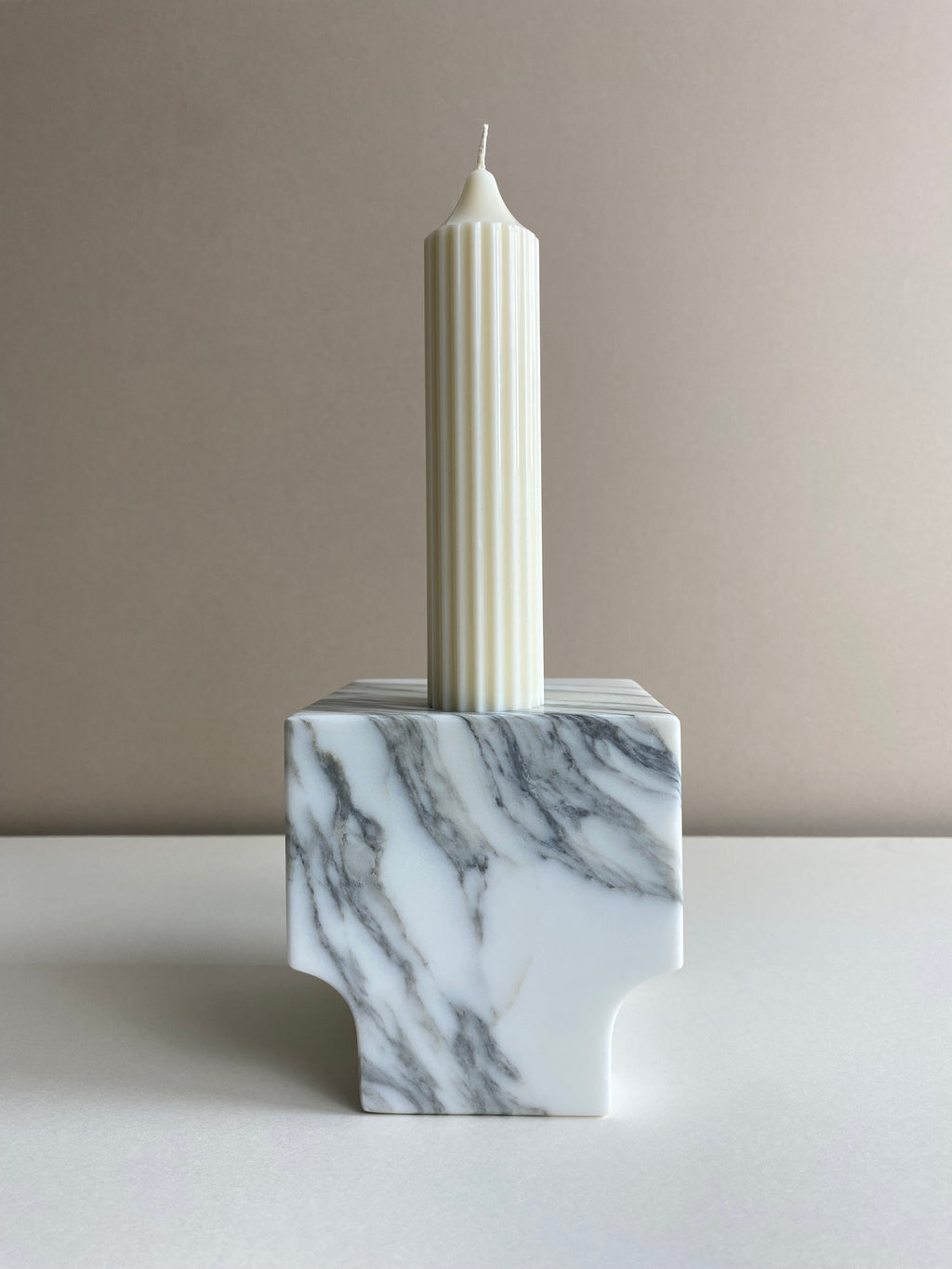 Atelier Ethos Tall Ribbed Pillar Candle Hand-poured in natural soy wax, a candle of sculptural elegance that celebrates artisanal craftsmanship. Sustainable, luxurious, and 10% of profits support charity. £18.00