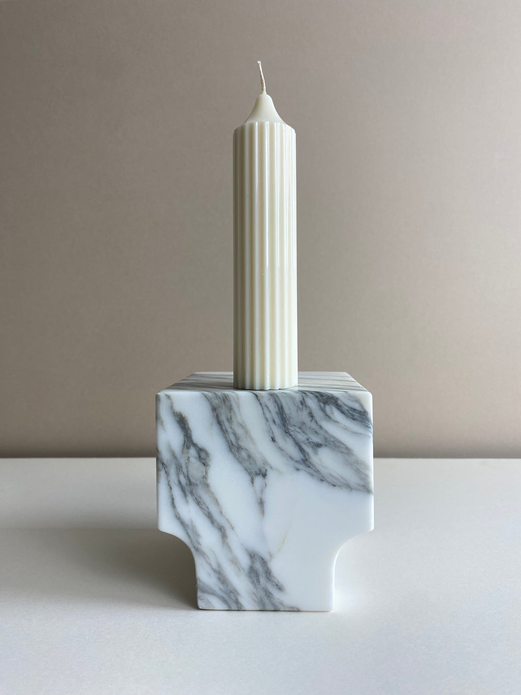 Atelier Ethos Tall Ribbed Pillar Candle Hand-poured in natural soy wax, a candle of sculptural elegance that celebrates artisanal craftsmanship. Sustainable, luxurious, and 10% of profits support charity. £18.00