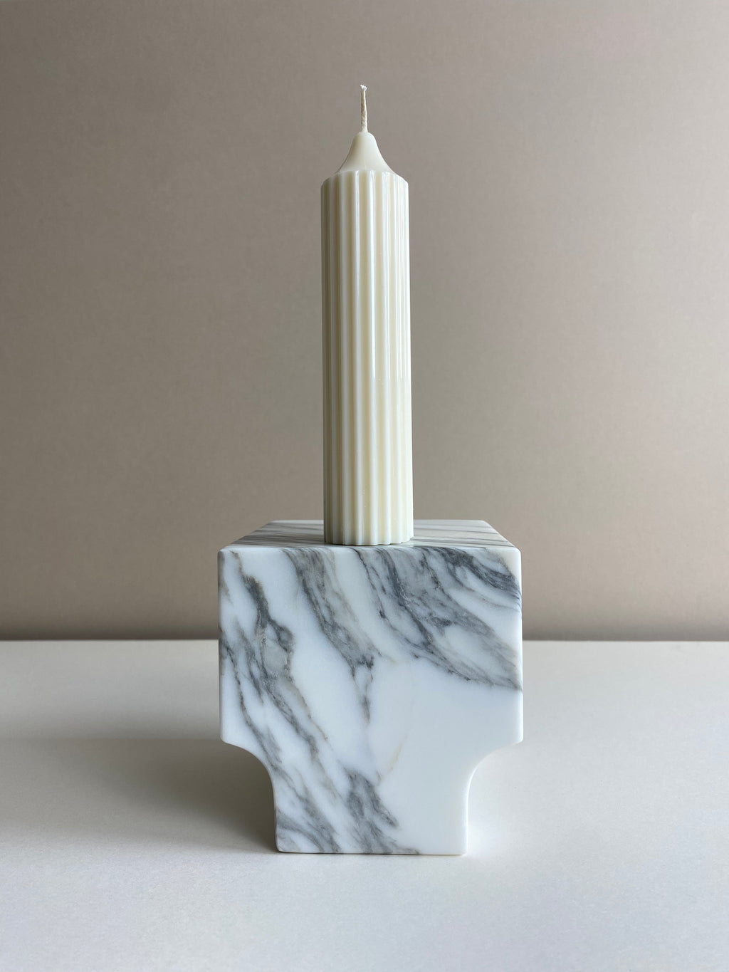 Atelier Ethos Tall Ribbed Pillar Candle Hand-poured in natural soy wax, a candle of sculptural elegance that celebrates artisanal craftsmanship. Sustainable, luxurious, and 10% of profits support charity. £18.00