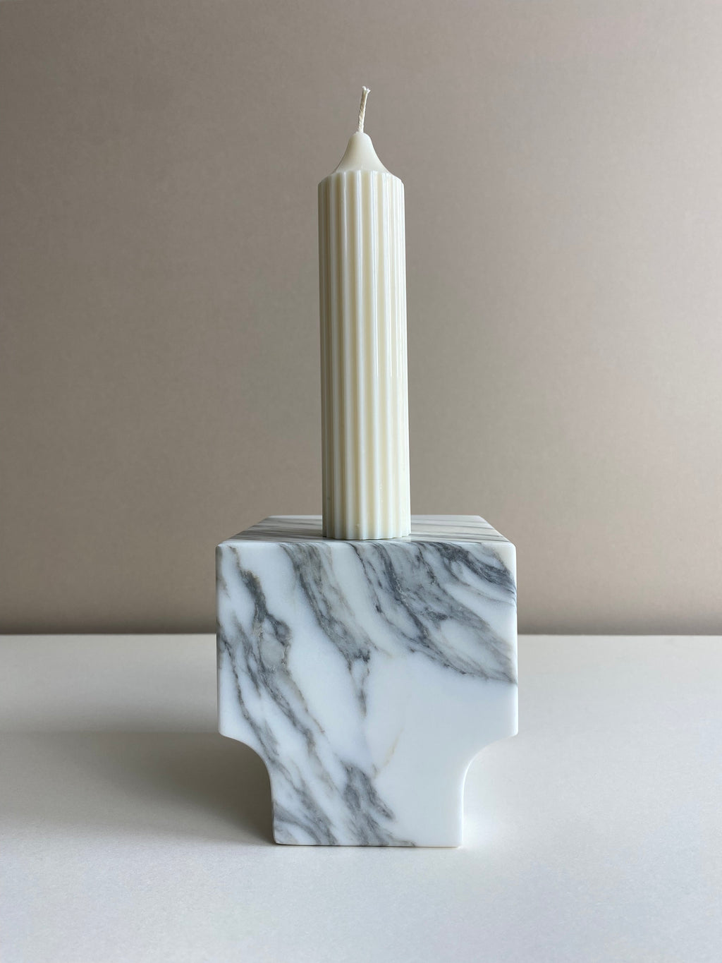 Atelier Ethos Tall Ribbed Pillar Candle Hand-poured in natural soy wax, a candle of sculptural elegance that celebrates artisanal craftsmanship. Sustainable, luxurious, and 10% of profits support charity. £18.00