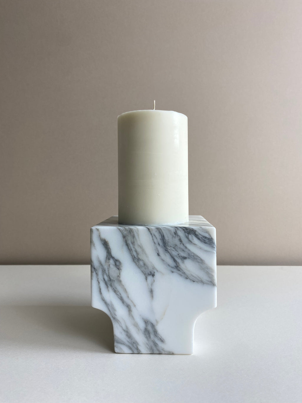 Atelier Ethos Tall Pillar Candle A candle in natural soy wax with elongated, graceful form, showcasing refined craftsmanship. Clean-burning, sustainable, and 10% of profits are donated to charity. £18.00