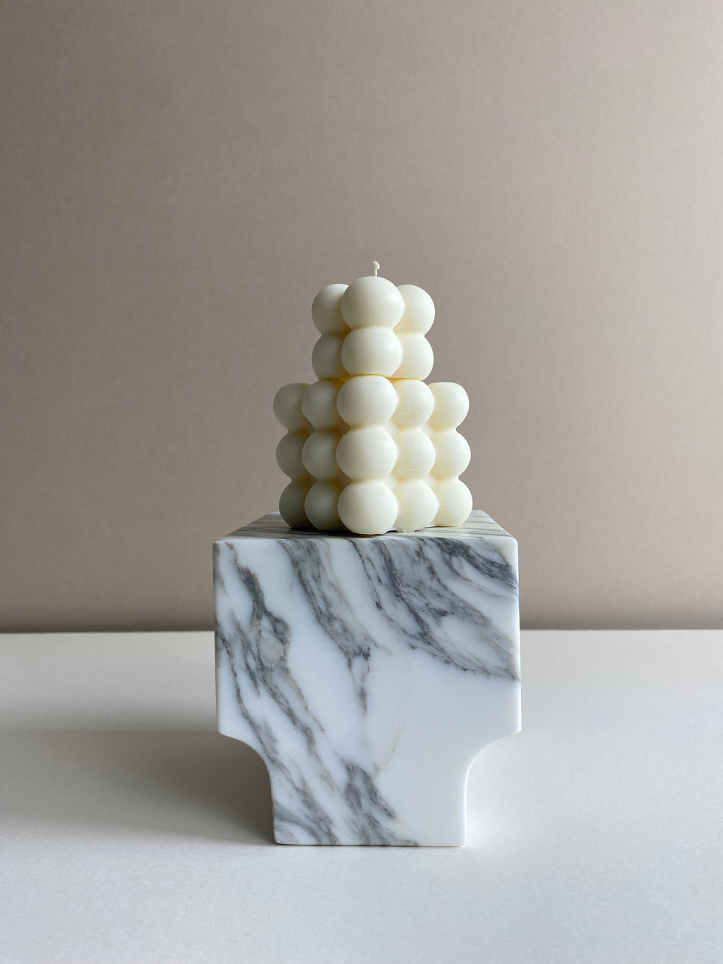 Atelier Ethos Pair Of Bubble Cube Candles Playful and sculptural, a candle pair in natural soy wax combines modern artistry with sustainable luxury. 10% of profits are donated to charity. £12.00